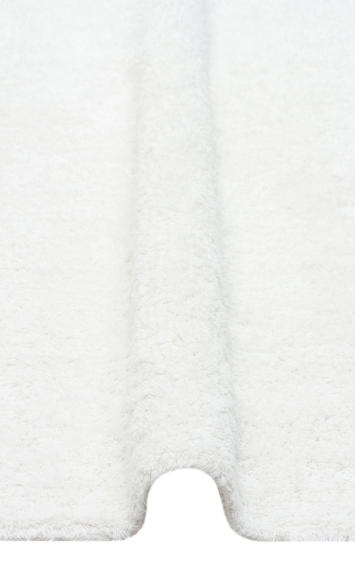 COTTON BOON CBN PLAIN WHITE yıkanabilir kaymaz tabanlı doğal pamuk bebek halısının kenar bitimi, şık saçak detayları ile zarif bir görünüm sunuyor.