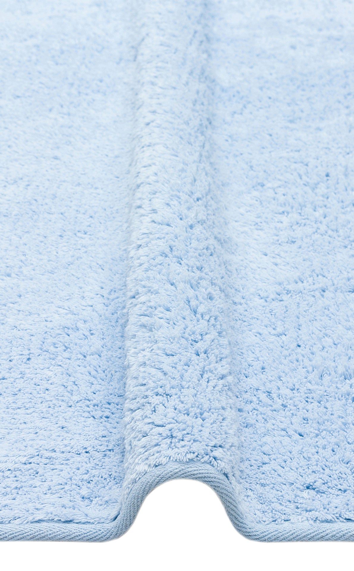 COTTON BOON CBN PLAIN BLUE Yıkanabilir Kaymaz Tabanlı Naturel Pamuk Bebek Halısı'nın detaylı görünümü, yıkanabilir ve kaymaz özelliklerini sergiliyor.