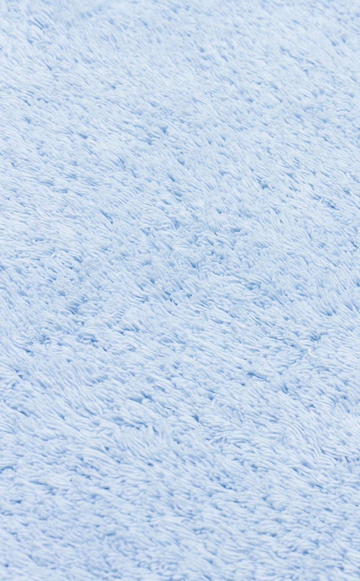 COTTON BOON CBN PLAIN BLUE Yıkanabilir Kaymaz Tabanlı Naturel Pamuk Bebek Halısı, şık saçak kenarlarıyla çocuk odalarına zarafet katıyor.