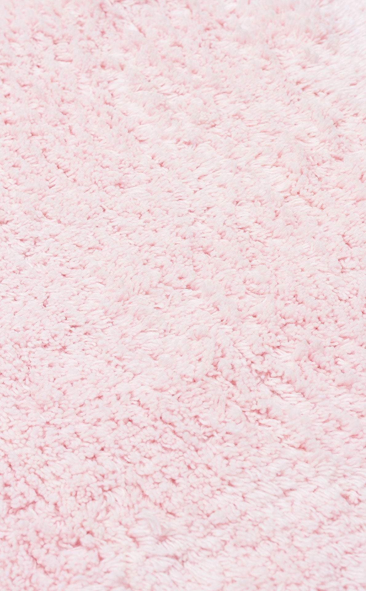 COTTON BOON CBN PLAIN POWDER yıkanabilir bebek halısının doğal renk tonları ve saçak detayları.