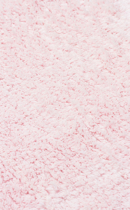 COTTON BOON CBN PLAIN POWDER yıkanabilir bebek halısının doğal renk tonları ve saçak detayları.